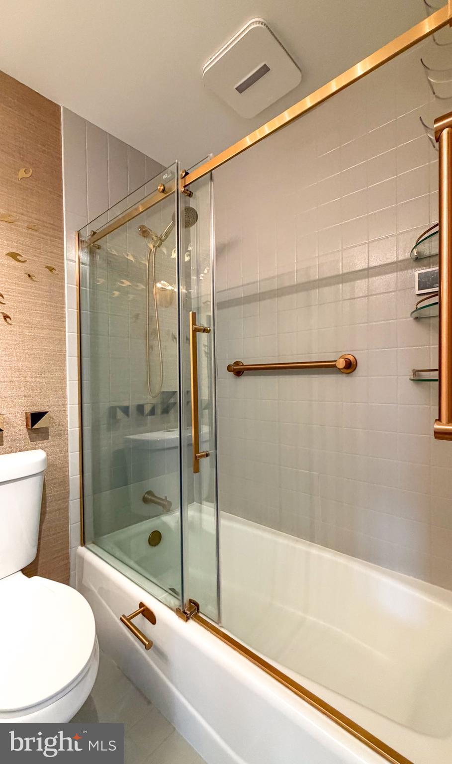 1530 Key Boulevard, Unit 1321 Arlington, VA 22209 - Photo 17 of 42 a bathroom with a toilet and a shower