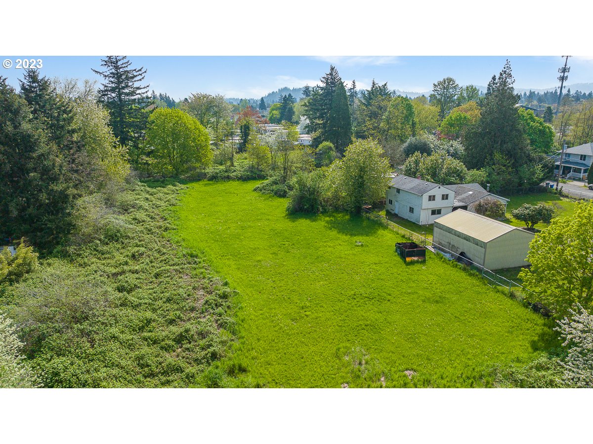 16315 Southeast Lincoln Street Portland, OR 97233 - Photo 16 of 32 a open area with trees in the background