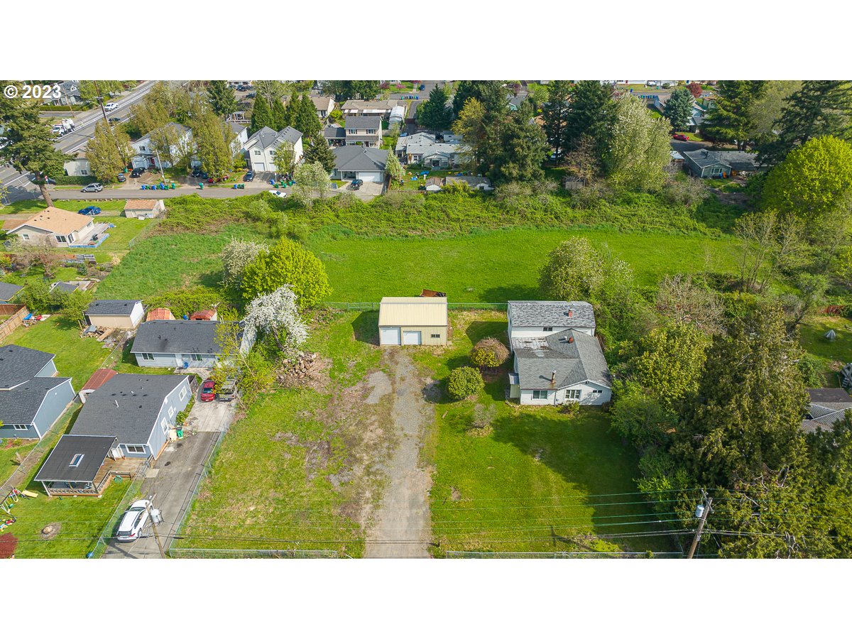16315 Southeast Lincoln Street Portland, OR 97233 - Photo 20 of 32 a open area with lots of trees