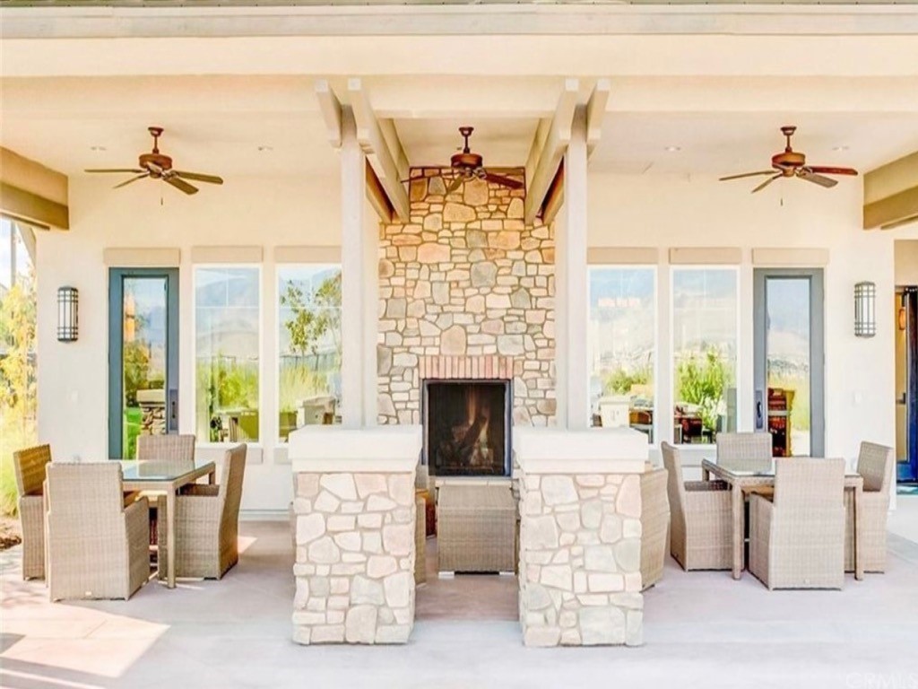 1603 Sams Canyon Beaumont, CA 92223 - Photo 13 of 18 a living room with fireplace furniture and a large window