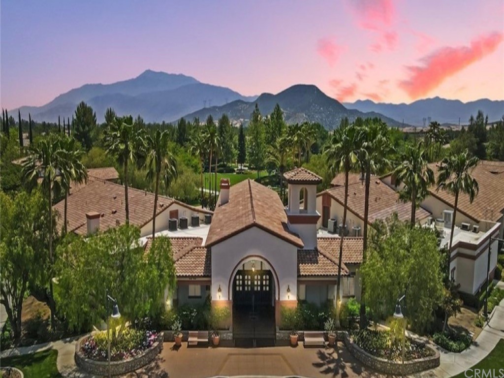 1603 Sams Canyon Beaumont, CA 92223 - Photo 14 of 18 a view of a house with a yard and a large tree