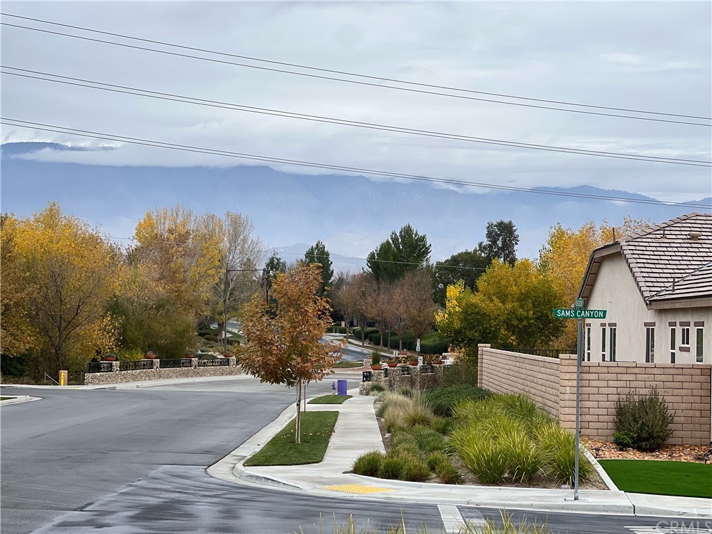 1603 Sams Canyon Beaumont, CA 92223 - Photo 17 of 18 a view of a house with a yard