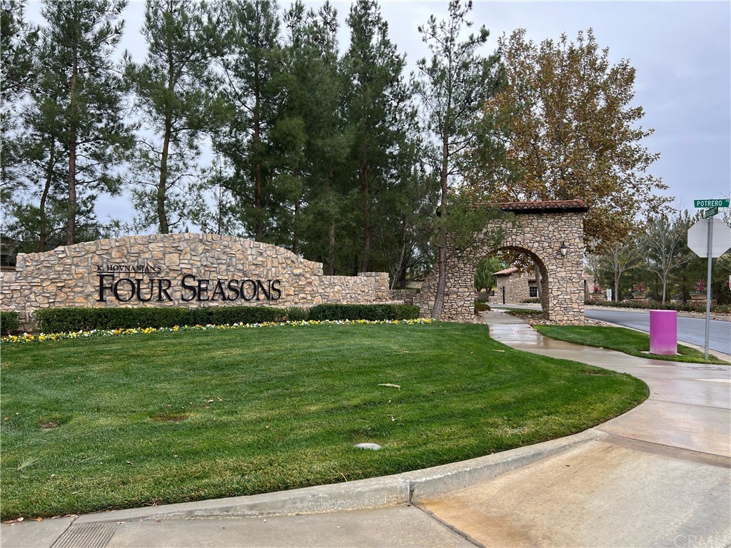 1603 Sams Canyon Beaumont, CA 92223 - Photo 18 of 18 a view of a garden with swimming pool