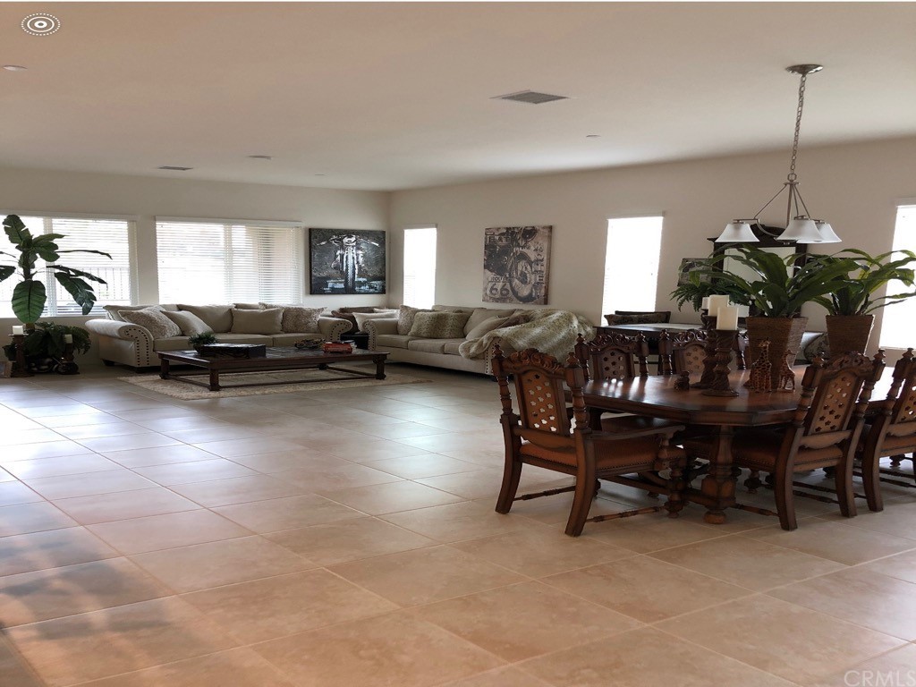 1603 Sams Canyon Beaumont, CA 92223 - Photo 5 of 18 a living room with furniture and a window