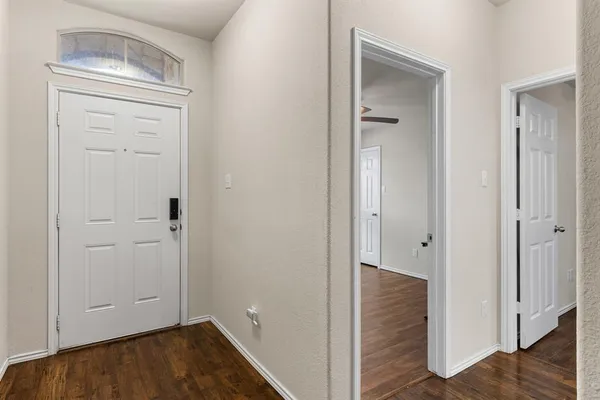 wooden floor with closet