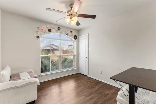 a view of livingroom with furniture wooden floor and window