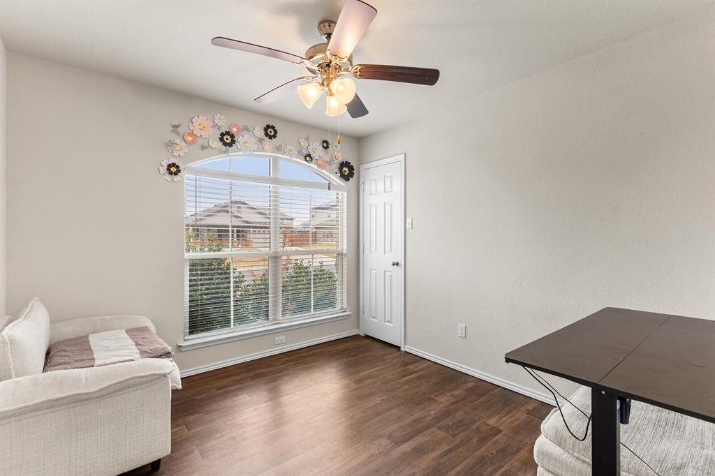 11233 Buzzard Gulch Drive Waco, TX 76708 - Photo 14 of 37 a view of livingroom with furniture wooden floor and window