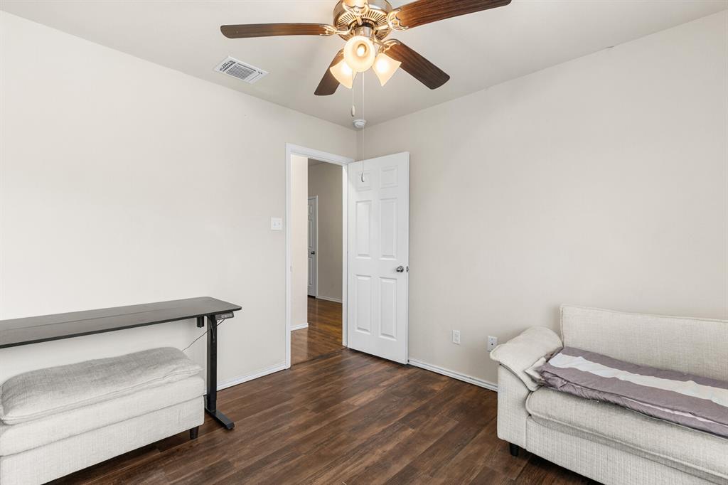 11233 Buzzard Gulch Drive Waco, TX 76708 - Photo 15 of 37 a view of room with wooden floor and fan