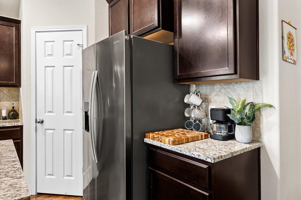 11233 Buzzard Gulch Drive Waco, TX 76708 - Photo 30 of 37 a kitchen with a sink and cabinets
