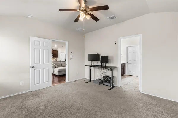 a view of a livingroom with a furniture and a flat screen tv