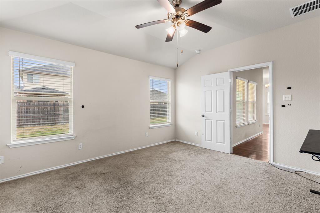 11233 Buzzard Gulch Drive Waco, TX 76708 - Photo 34 of 37 a view of an empty room with a window