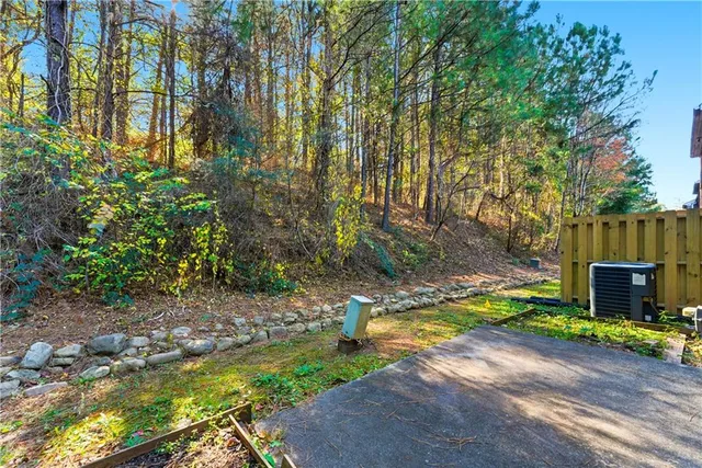 a view of a yard with swimming pool