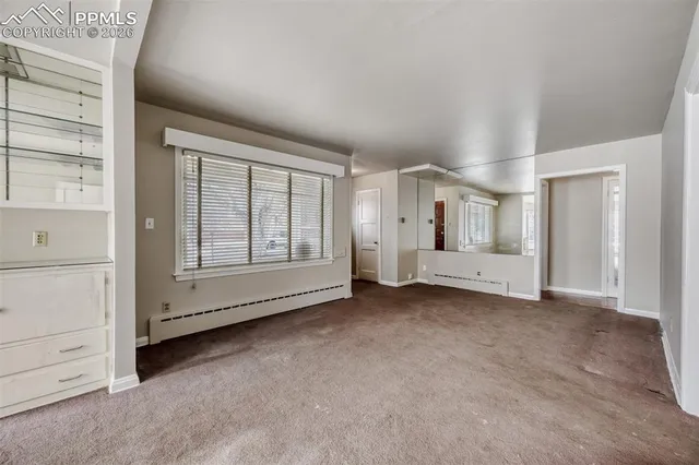 an empty room with windows