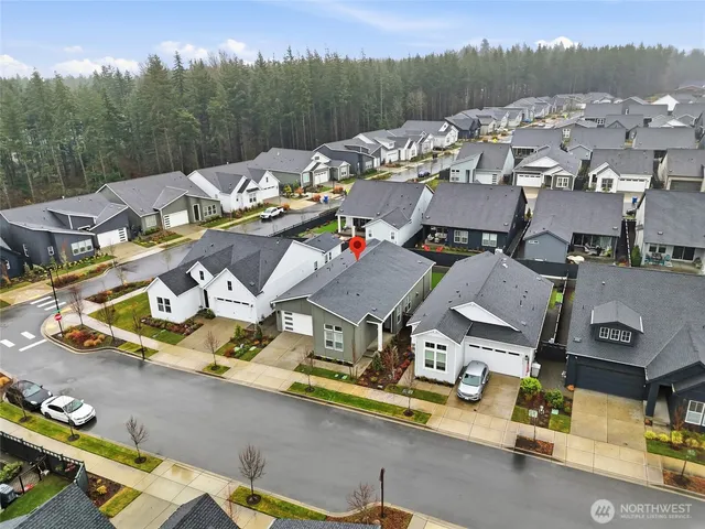 a view of a swimming pool with lounge chairs