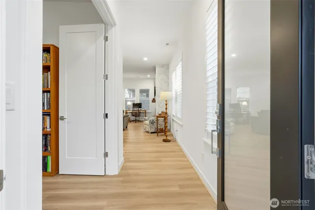 a view of a living room with a wooden floor