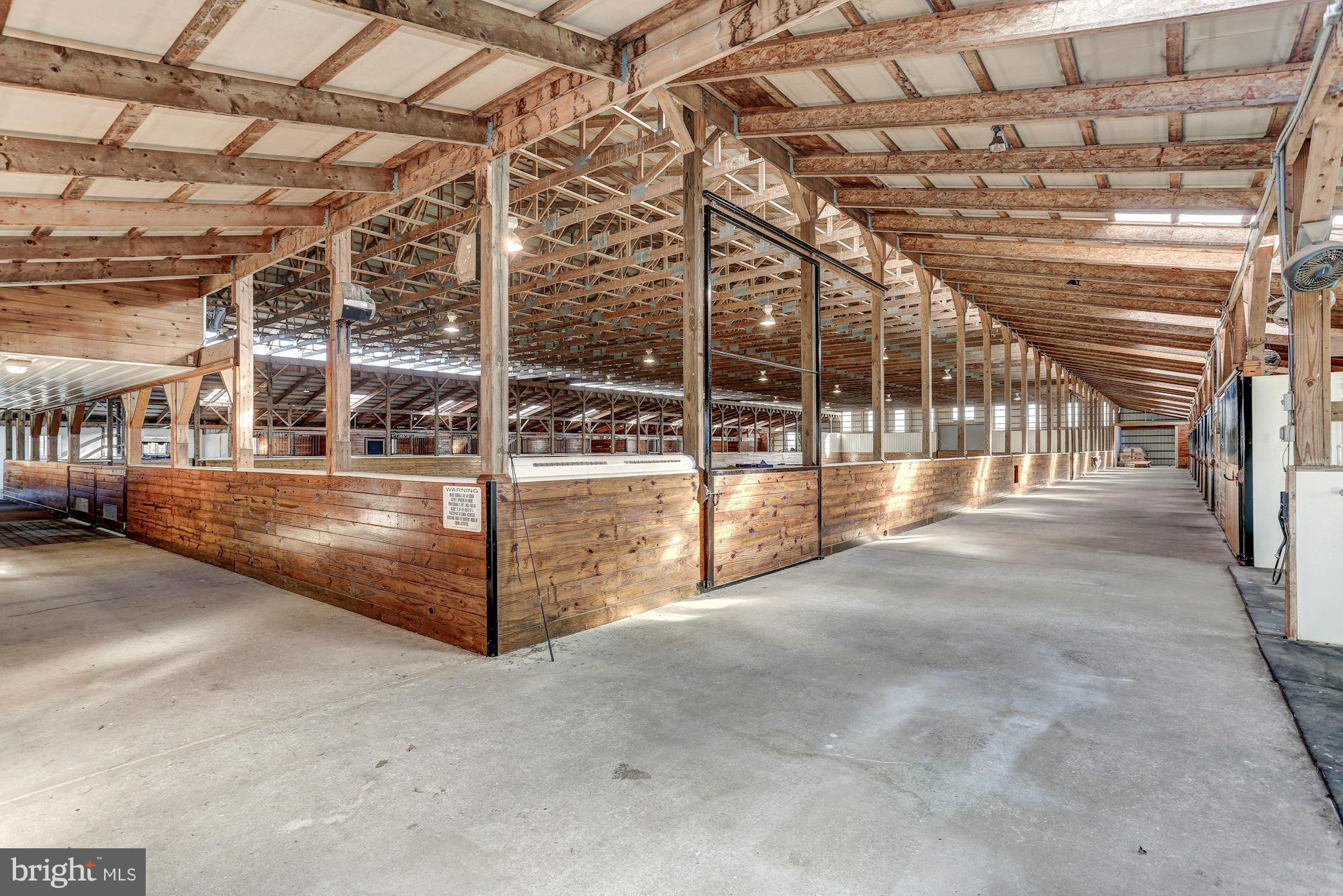 2173 Laws Ford Road Catlett, VA 20119 - Photo 25 of 29 barn aisle