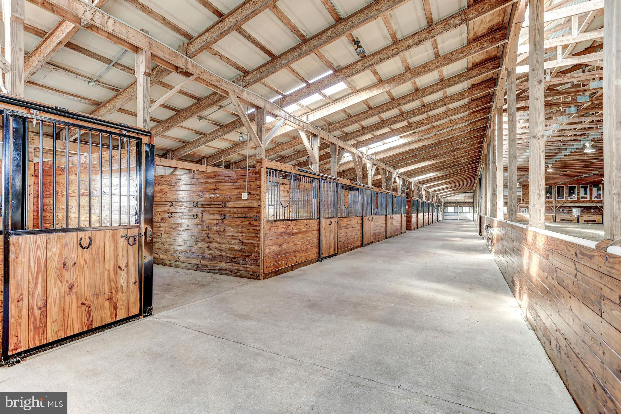 2173 Laws Ford Road Catlett, VA 20119 - Photo 28 of 29 barn aisle