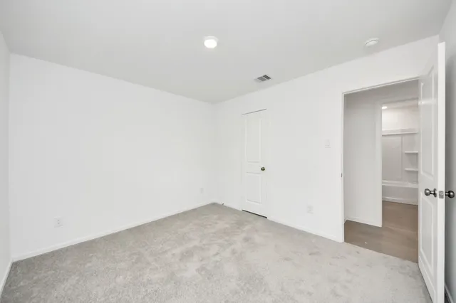 a bathroom with a sink mirror toilet and bathtub