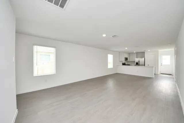 an empty room with windows