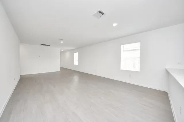 a view of a kitchen with electric appliances