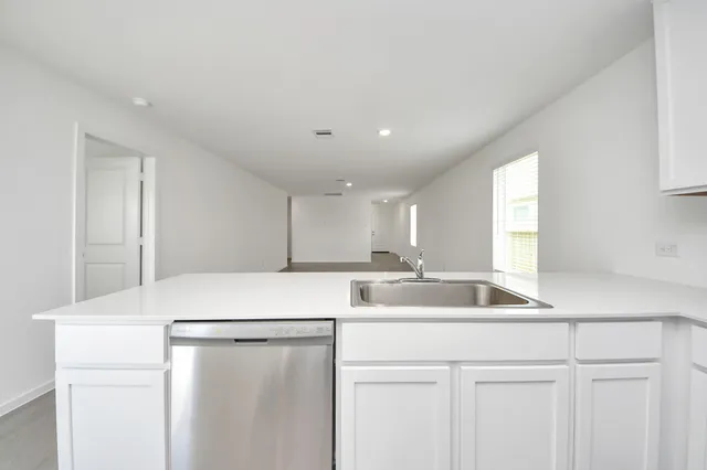 a bathroom with a bathtub sink and toilet
