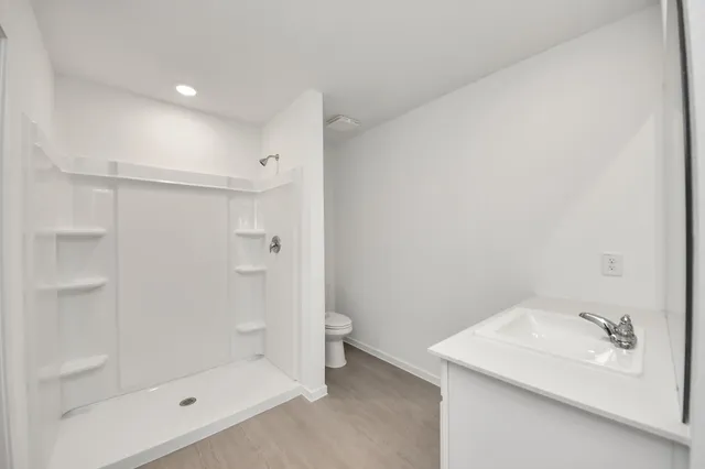 a view of an empty walk in closet