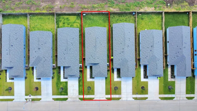 a view of a yard with an outdoor space