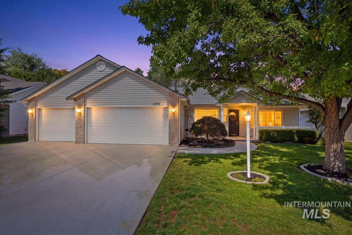2075 North Springland Place Boise, ID 83713 - Photo 1 of 49 Ranch-style residence featuring light-toned siding and brick accents