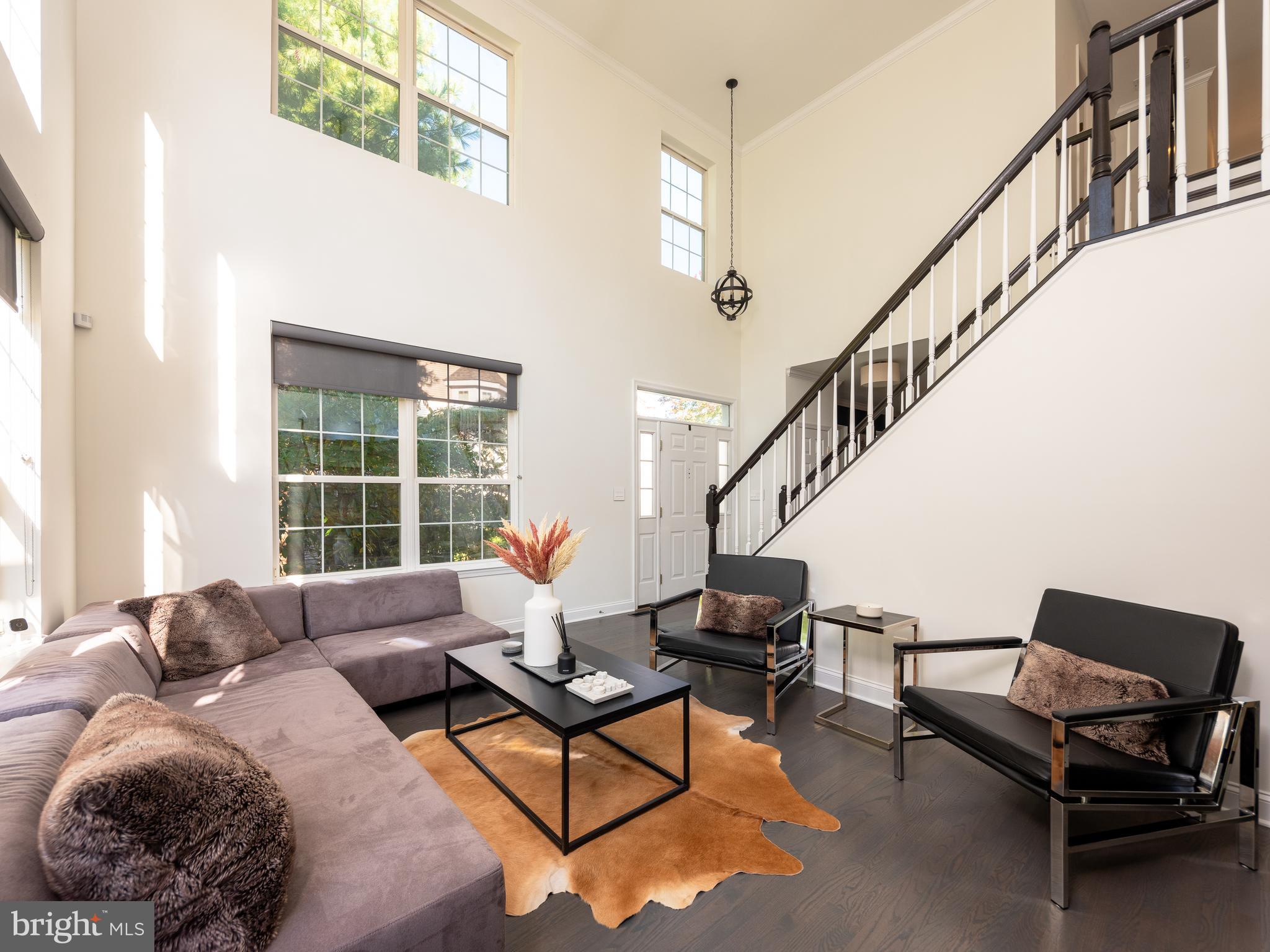 80 Dispatch Drive, Unit 97 Washington Crossing, PA 18977 - Photo 11 of 32 a living room with furniture and a window