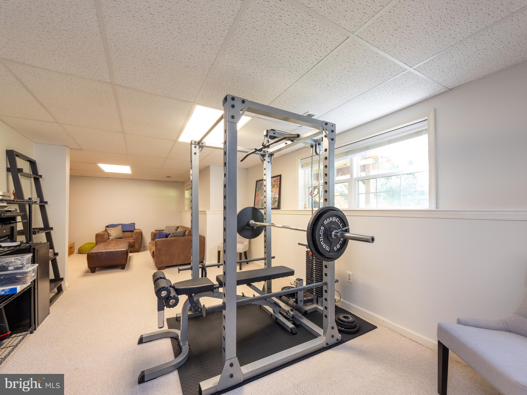 80 Dispatch Drive, Unit 97 Washington Crossing, PA 18977 - Photo 23 of 32 a view of a room with gym equipment