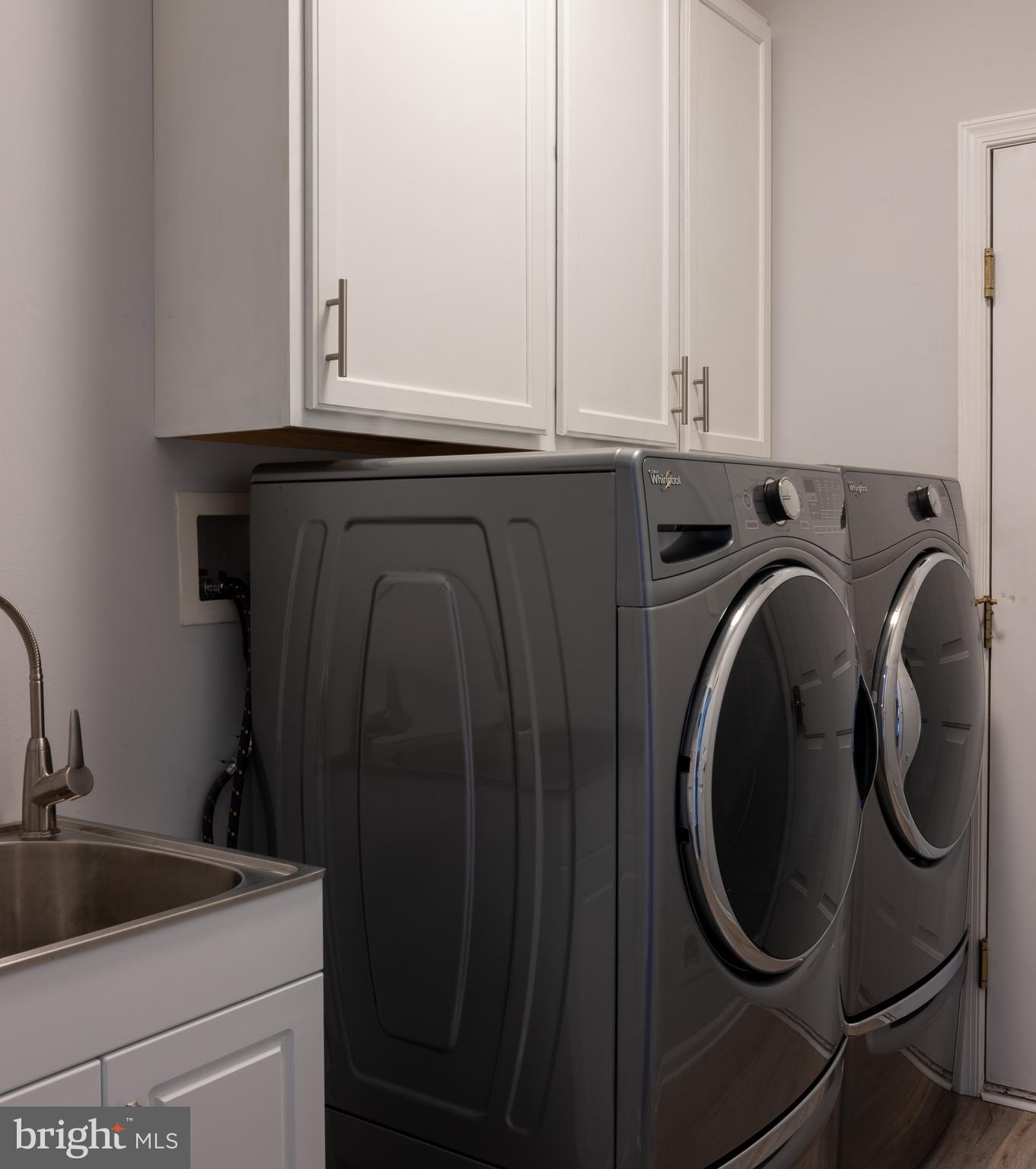 80 Dispatch Drive, Unit 97 Washington Crossing, PA 18977 - Photo 26 of 32 a utility room with dryer and washer