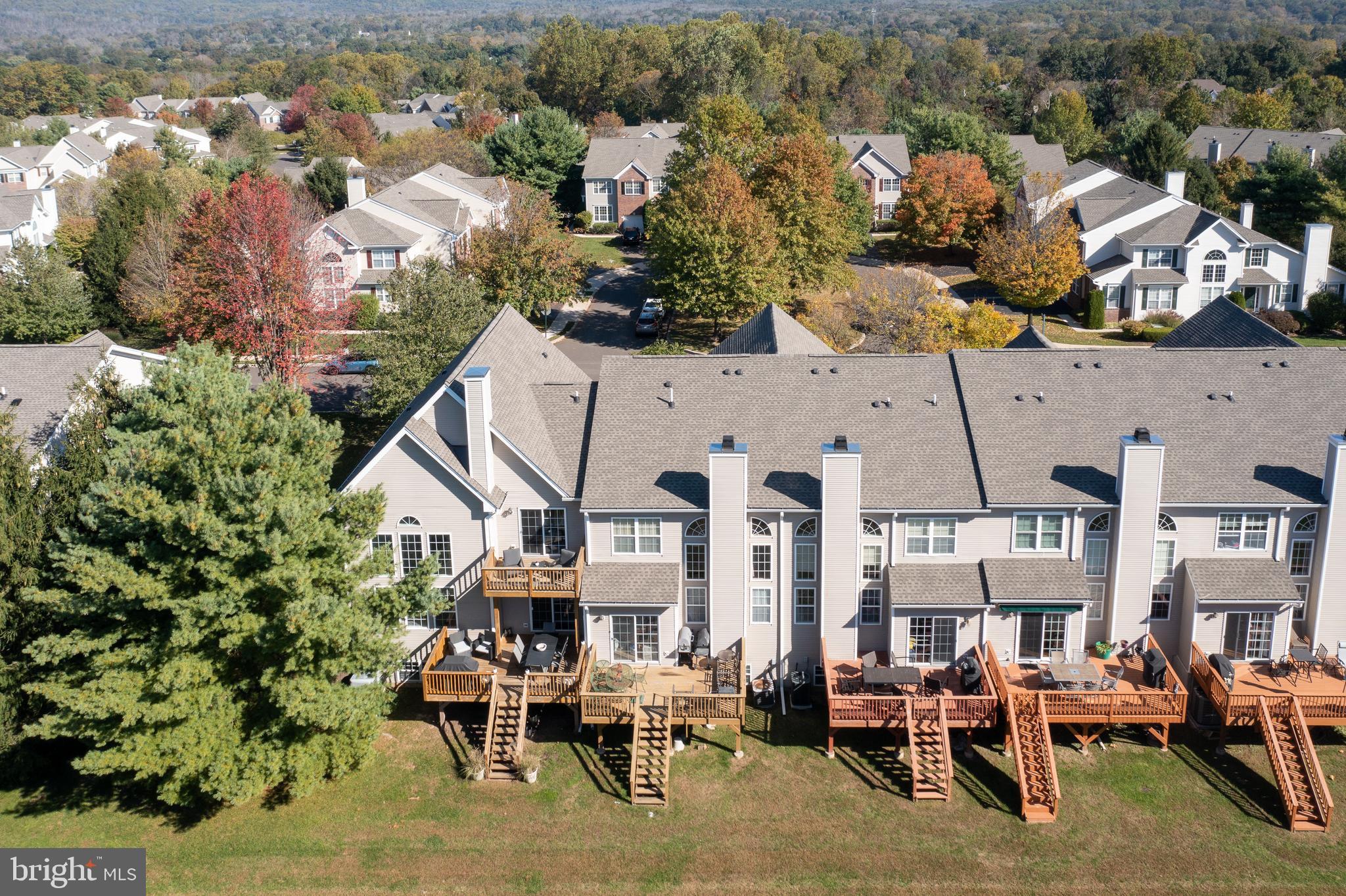 80 Dispatch Drive, Unit 97 Washington Crossing, PA 18977 - Photo 27 of 32 an aerial view of multiple houses with yard