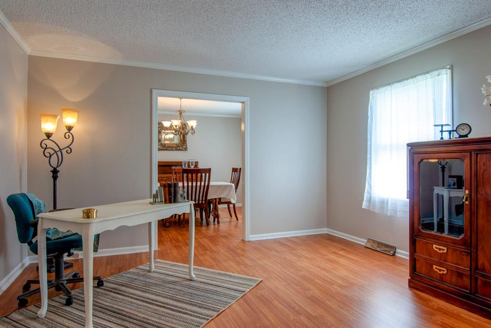 This lovely front living room has room to spread out! Create multiple seating areas if you like!