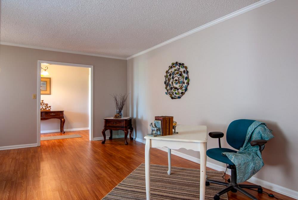 Wide door frames flank each end of the room, too.