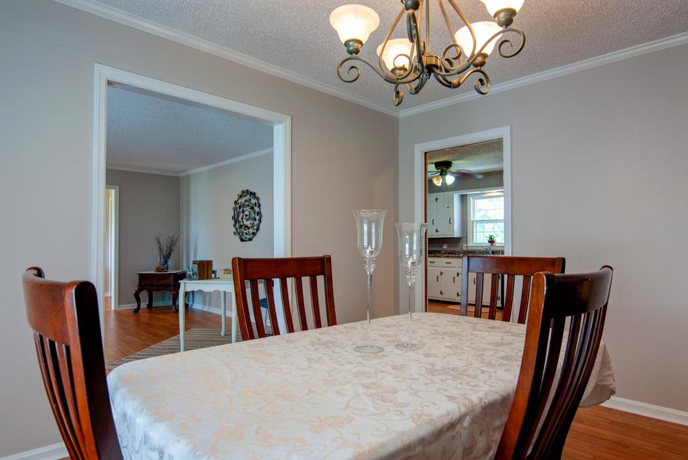 This formal dining room is off the kitchen so you have easy access and then a great view into the living room.