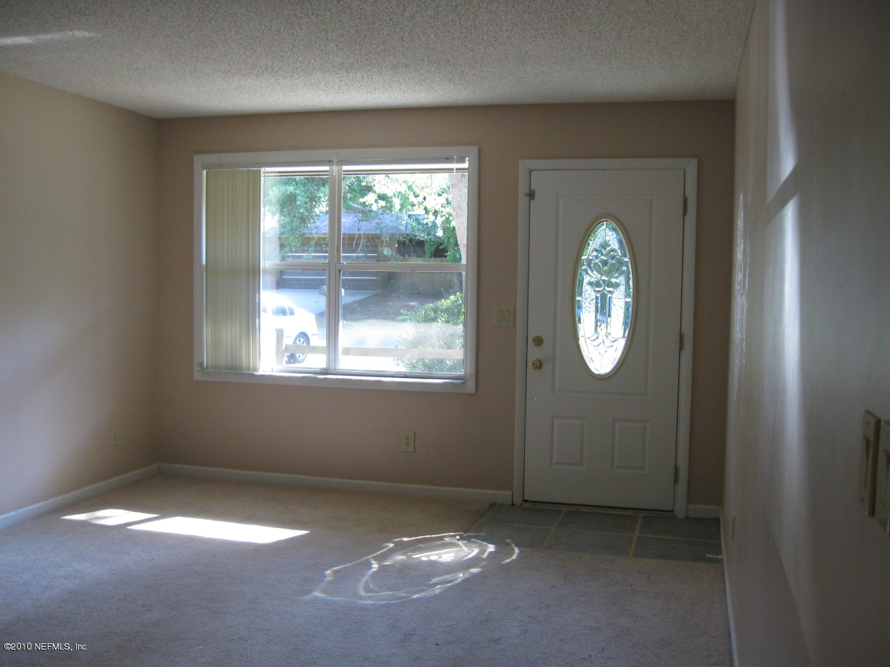 443 Jasmine Road St. Augustine, FL 32086 - Photo 6 of 10 an empty room with windows