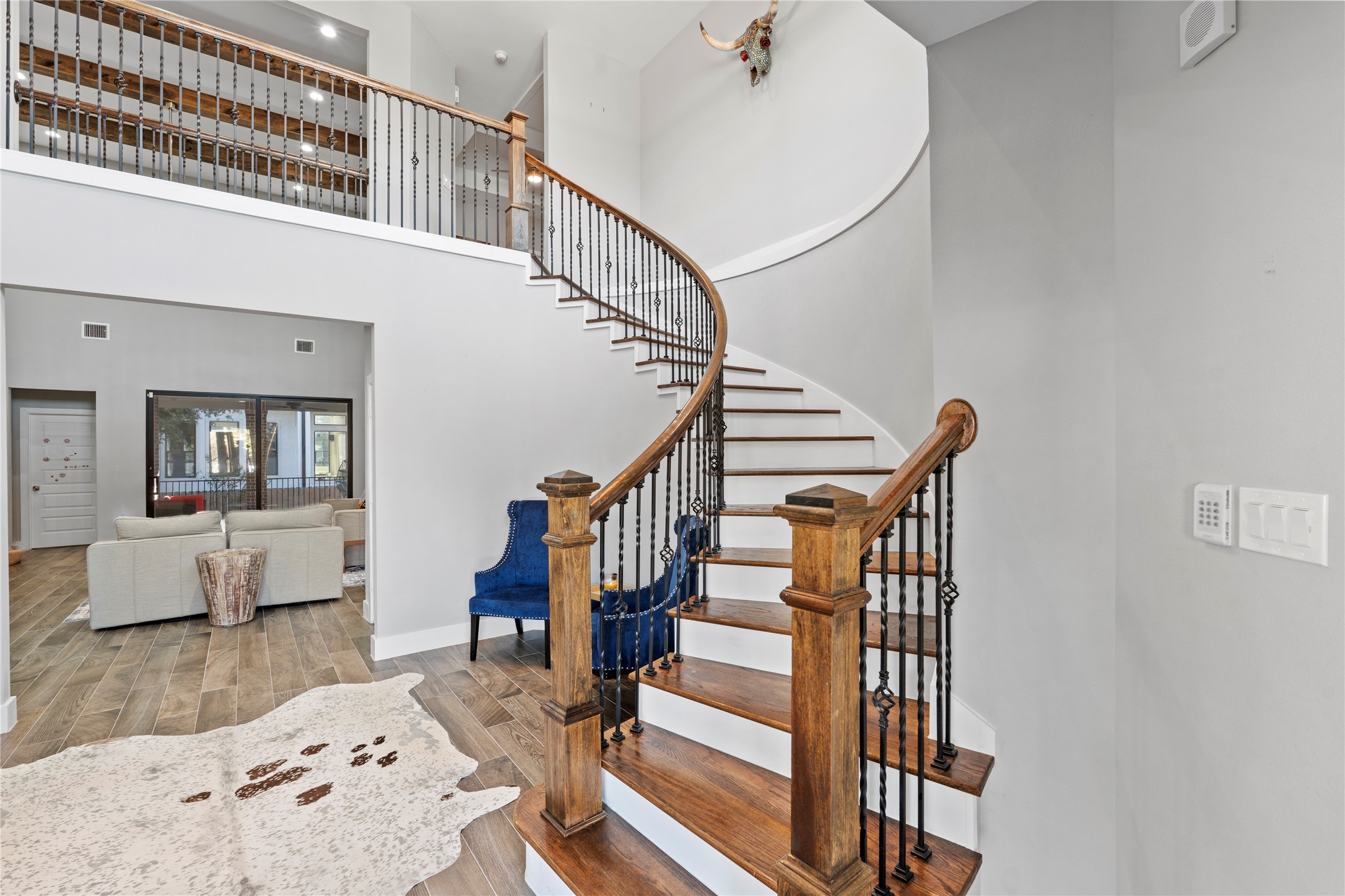 6207 Graff Net Court Spring, TX 77379 - Photo 11 of 49 Gorgeous curved wood staircase leading to the spacious game room.