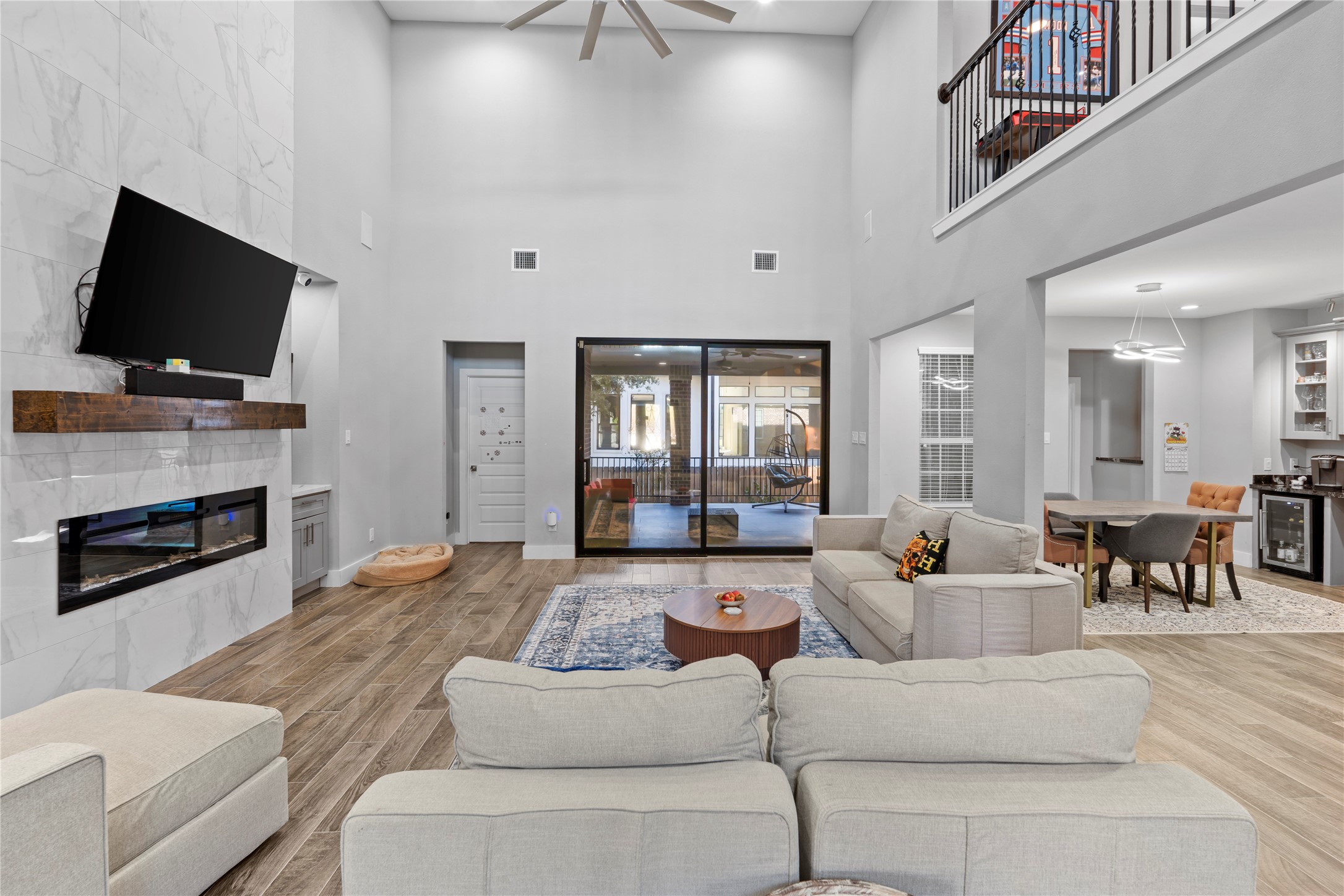 6207 Graff Net Court Spring, TX 77379 - Photo 17 of 49 Spacious living area featuring high ceilings and an open layout.