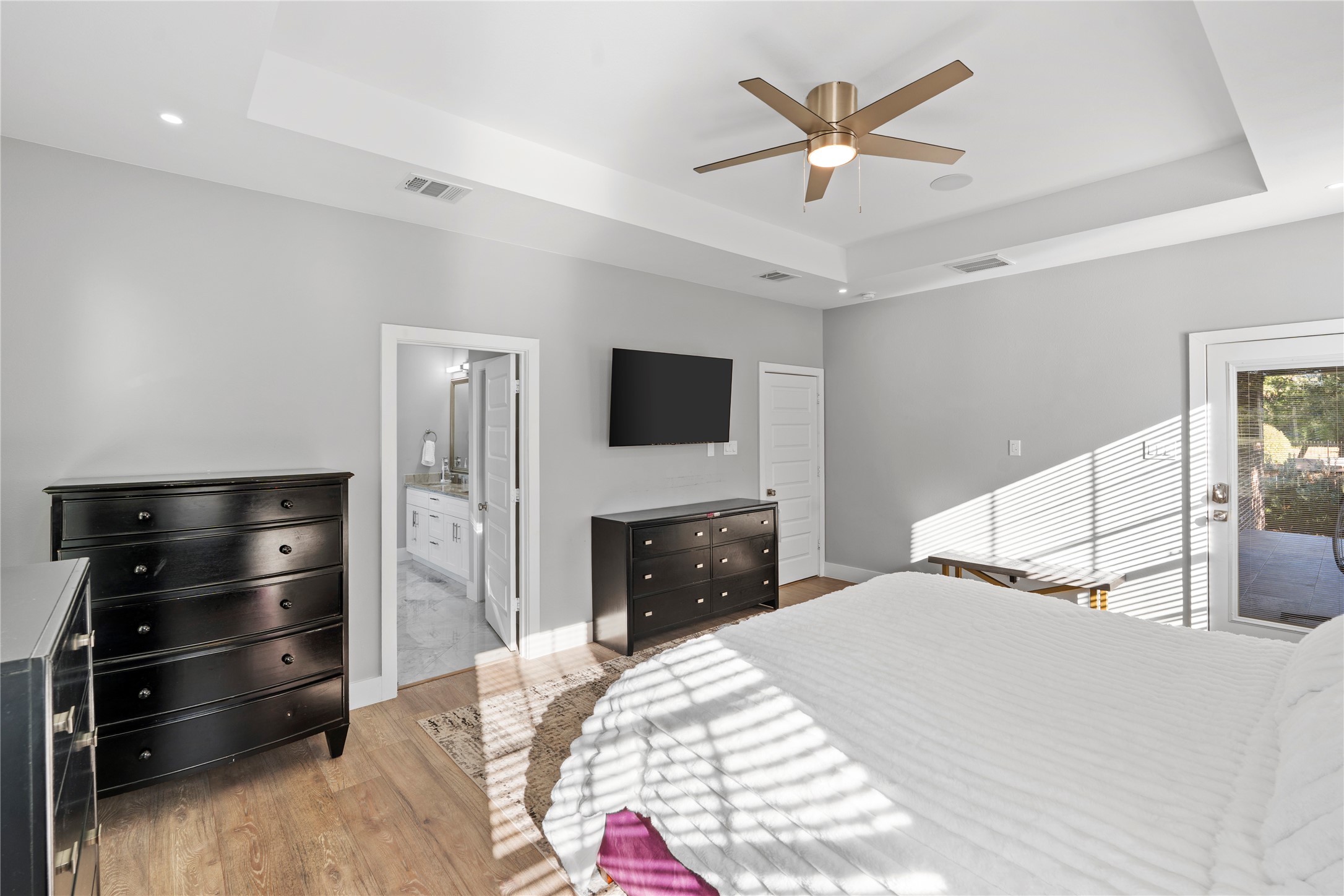 6207 Graff Net Court Spring, TX 77379 - Photo 24 of 49 Enjoy direct backyard access from your primary bedroom for fresh air and morning sun. The perfect way to start your day!