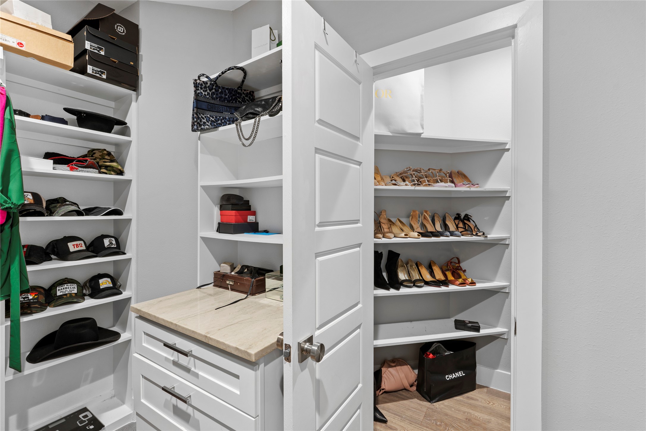 6207 Graff Net Court Spring, TX 77379 - Photo 28 of 49 Custom shelves for shoes galore, because one pair per shelf is a thing of the past!