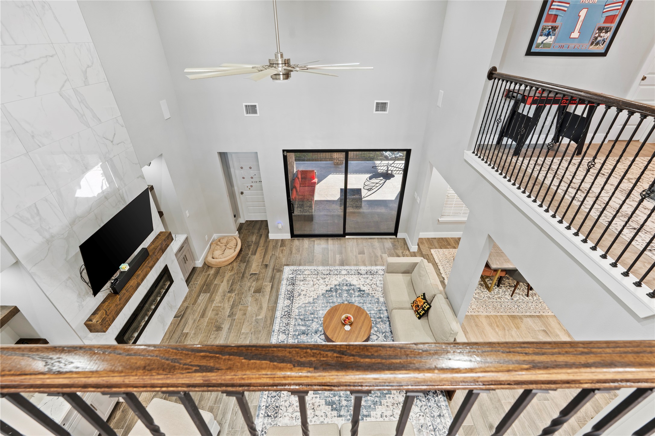 6207 Graff Net Court Spring, TX 77379 - Photo 39 of 49 Overlook your living room from the upstairs railing, the perfect view from above!