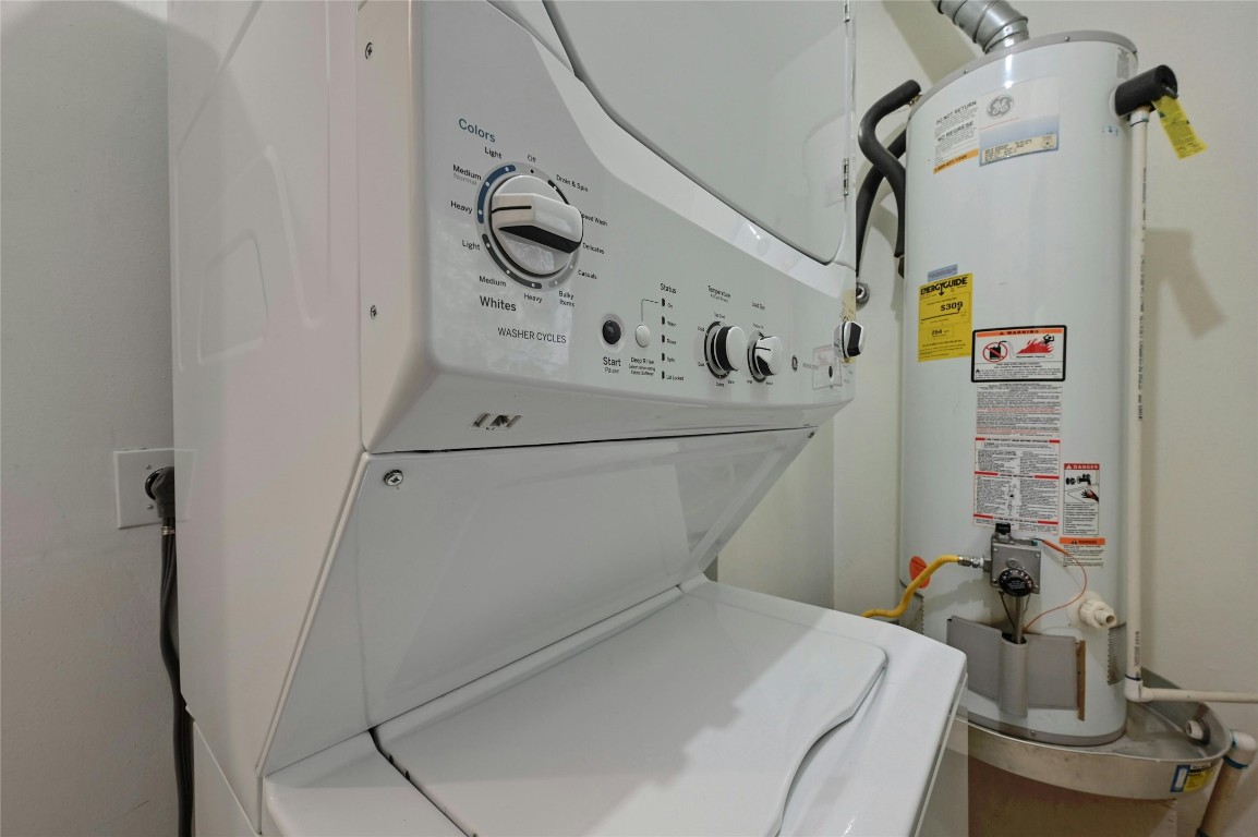 515 Pecan Grove Road, Unit A Austin, TX 78704 - Photo 13 of 17 a utility room with dryer and washer