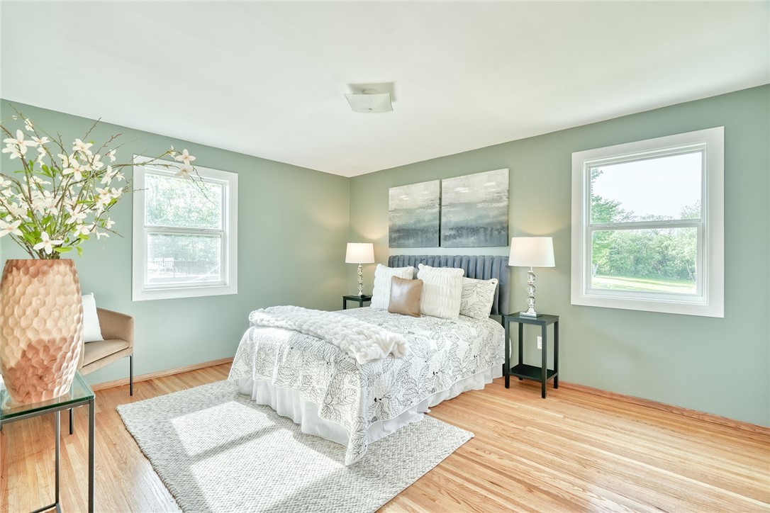 1815 Woodard Road Webster, NY 14580 - Photo 19 of 45 IMPRESSIVE PRIMARY BEDROOM * BEAUTIFUL HARDWOODS!