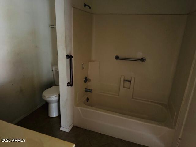 4044 East Carson Road Phoenix, AZ 85042 - Photo 21 of 22 a bathroom with a granite countertop toilet a sink and shower
