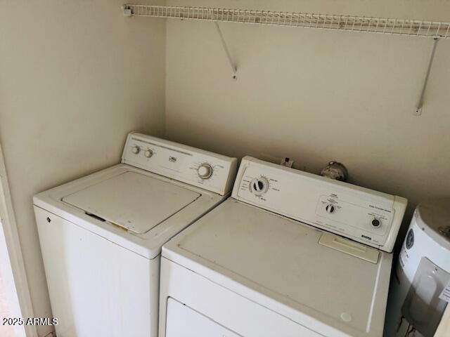 4044 East Carson Road Phoenix, AZ 85042 - Photo 22 of 22 a utility room with dryer and washer