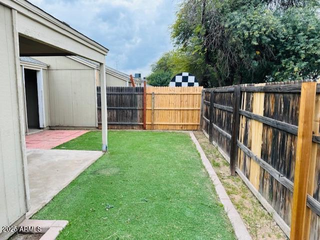 4044 East Carson Road Phoenix, AZ 85042 - Photo 7 of 22 a backyard of a house with lots of green space