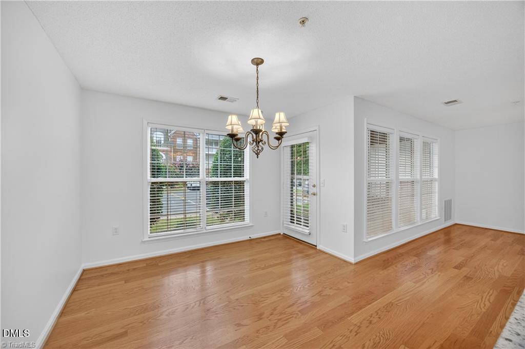 2221 Delaney Drive, Unit 114 Burlington, NC 27215 - Photo 10 of 18 a view of an empty room with a window