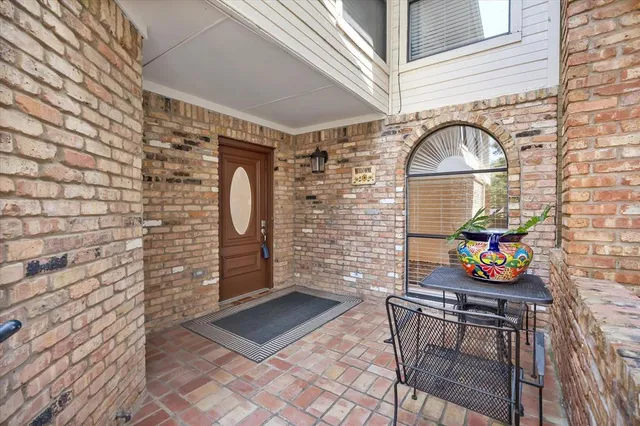 a front view of a house with outdoor space