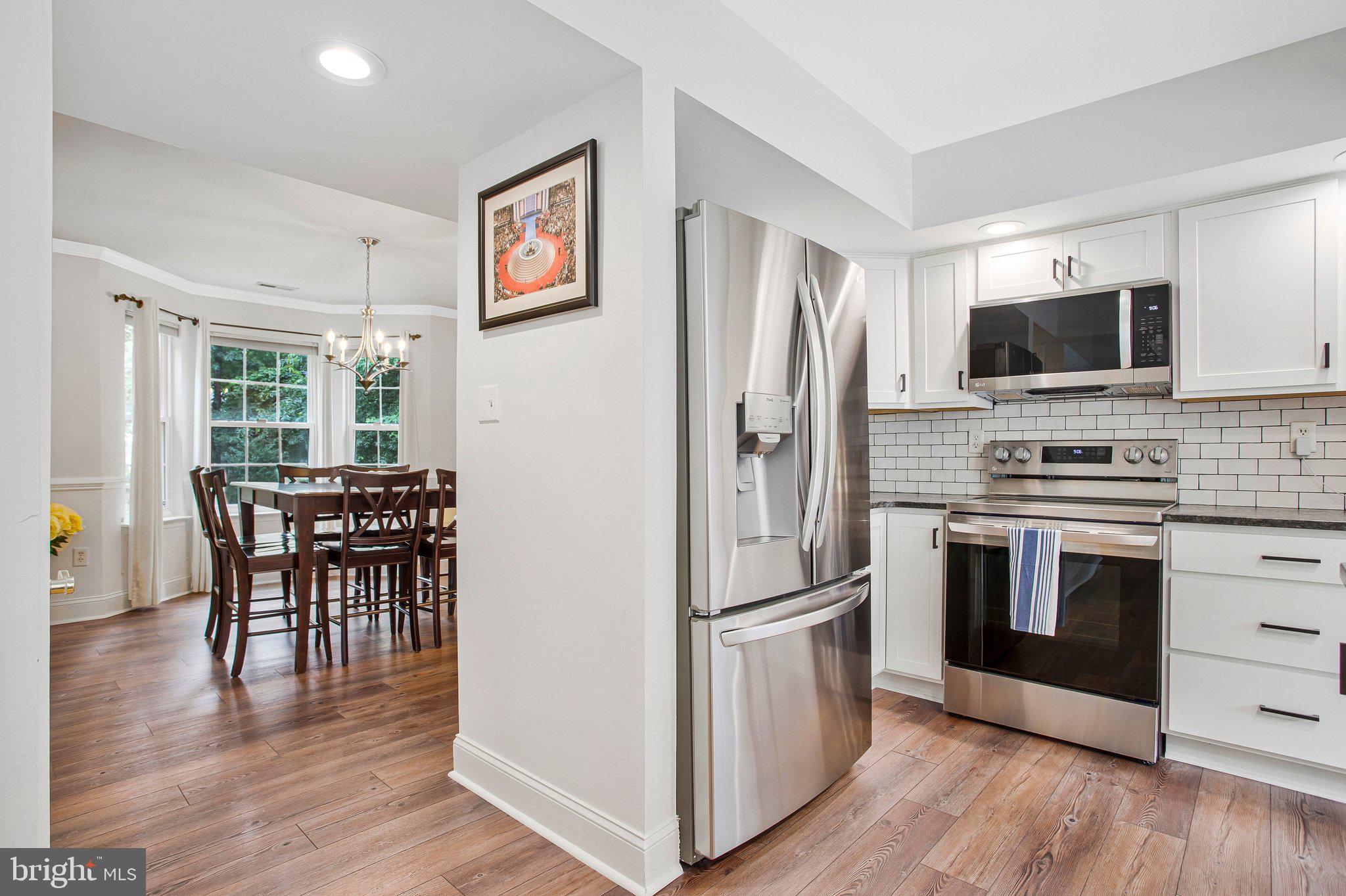 1582 Snug Harbor Road Shady Side, MD 20764 - Photo 20 of 53 Modern kitchen with open layout charm.