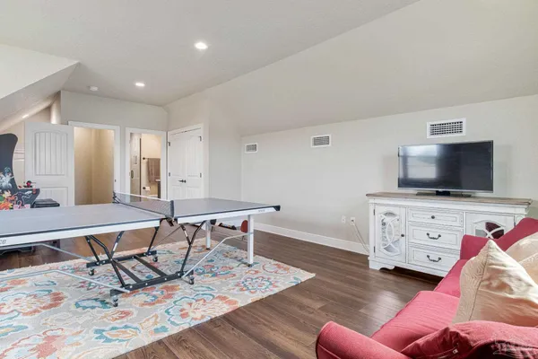 a outdoor space with patio the couches and a dining table with garden view